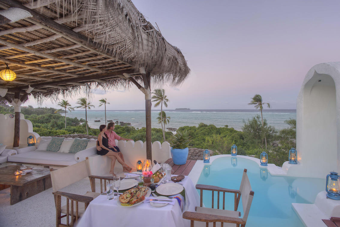 Matemwe Retreat private-roof-dinner set up